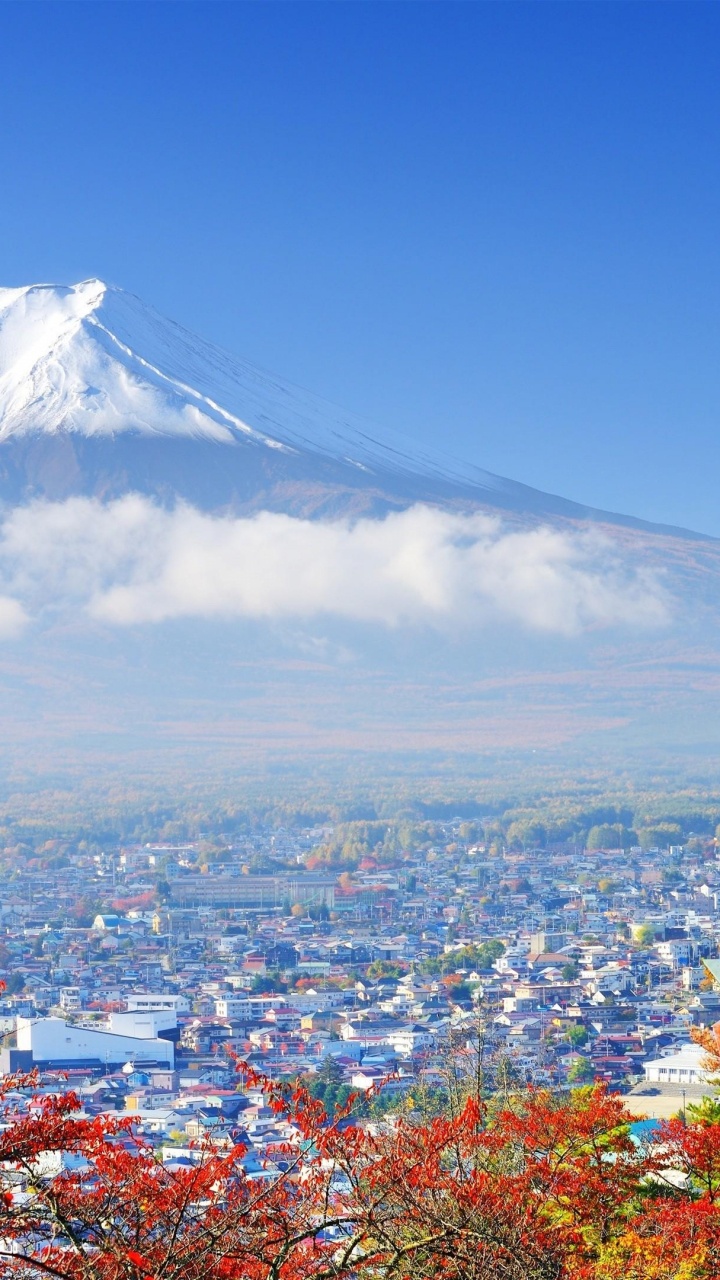 Aerial View of City Near Mountain Under Blue Sky During Daytime. Wallpaper in 720x1280 Resolution