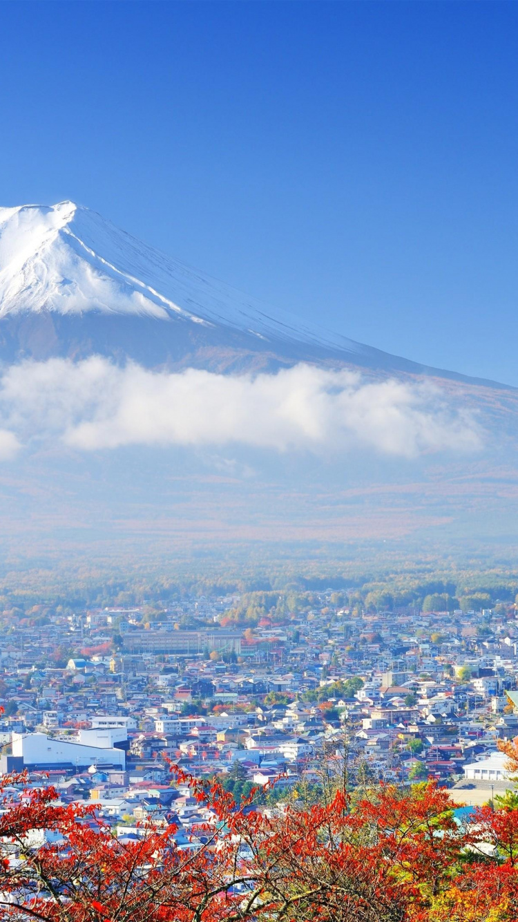 Aerial View of City Near Mountain Under Blue Sky During Daytime. Wallpaper in 750x1334 Resolution