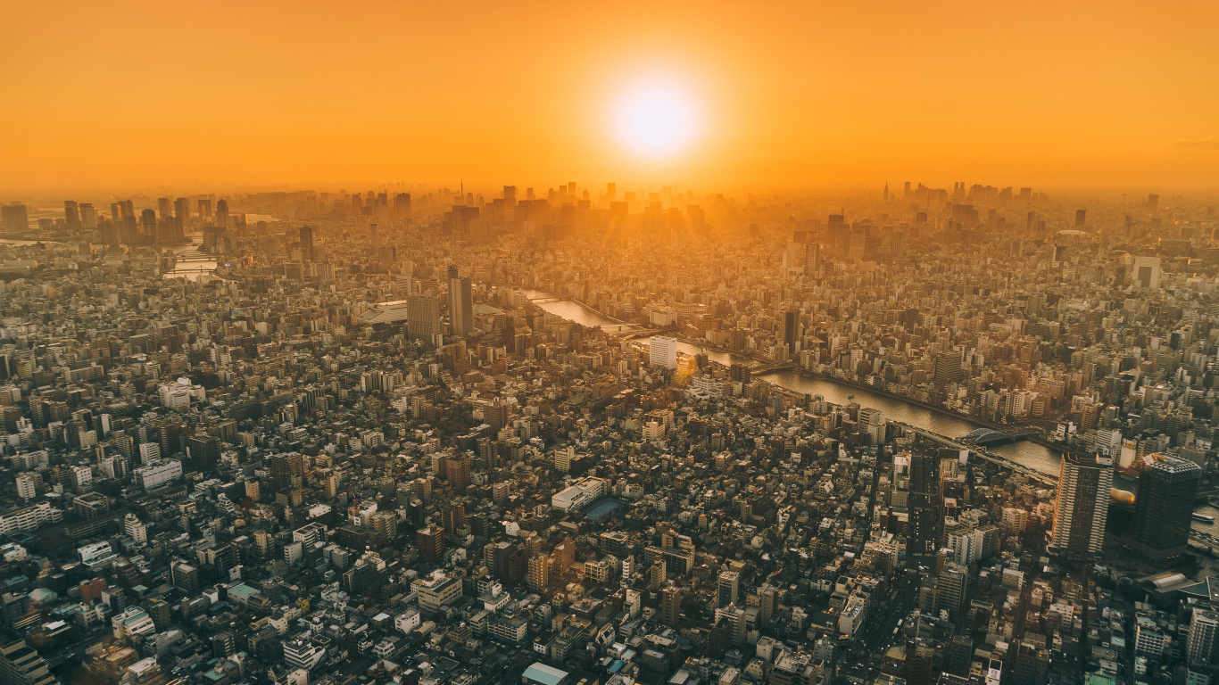 Vista Aérea de la Ciudad Durante la Puesta de Sol. Wallpaper in 1366x768 Resolution