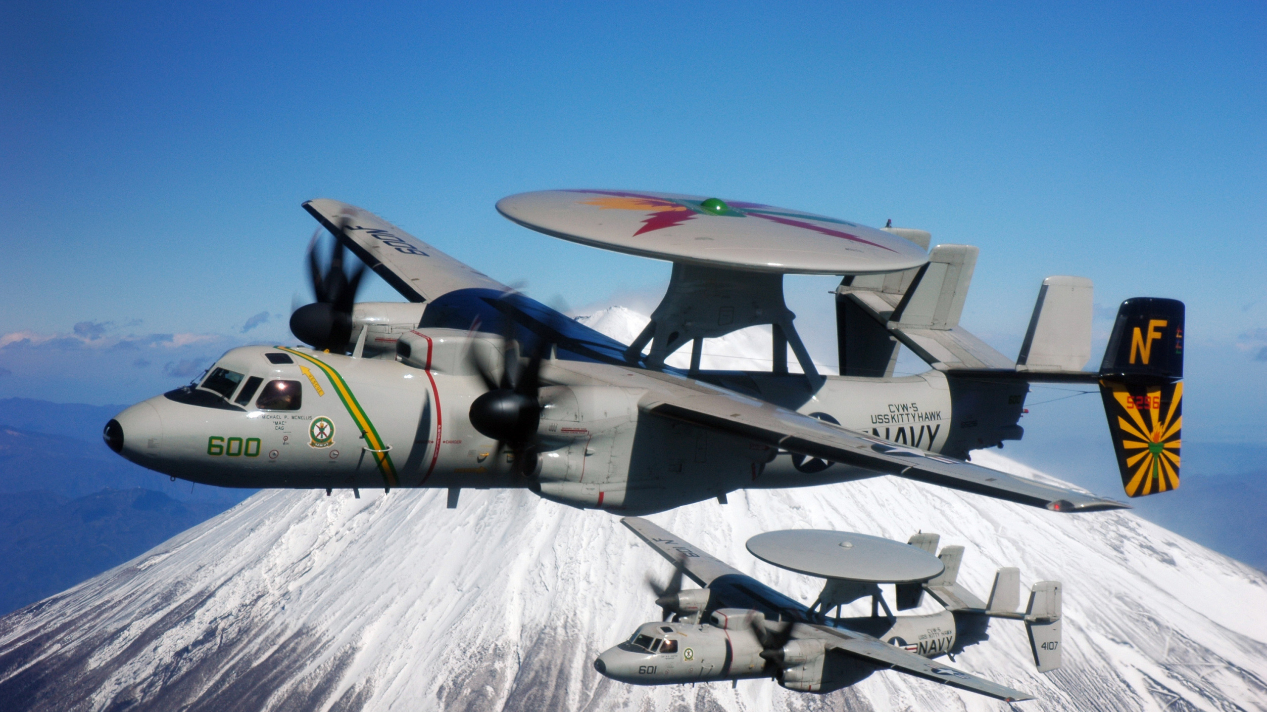 Gray and Black Fighter Plane Flying Over Snow Covered Mountain During Daytime. Wallpaper in 2560x1440 Resolution