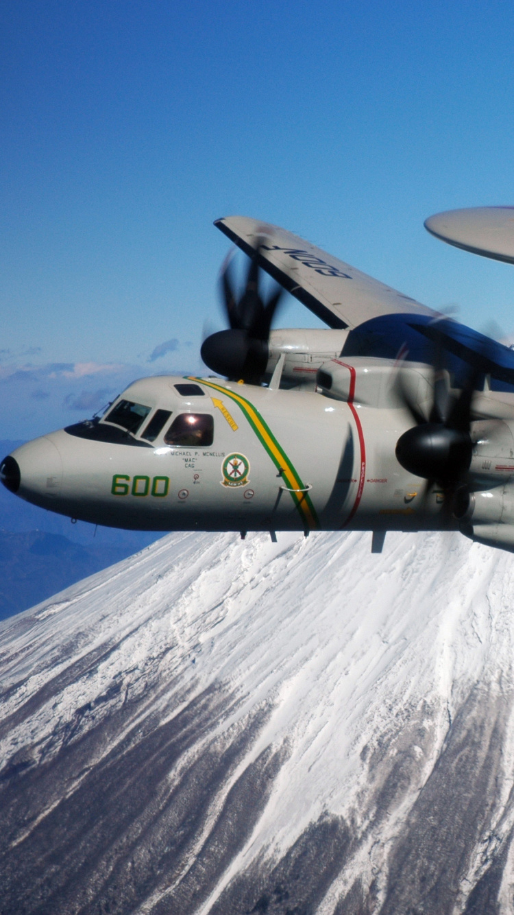 Gray and Black Fighter Plane Flying Over Snow Covered Mountain During Daytime. Wallpaper in 750x1334 Resolution