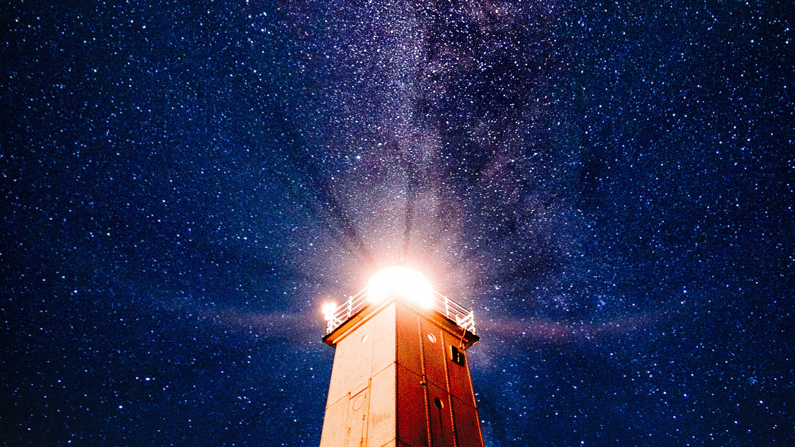 Brown Wooden House Under Starry Night. Wallpaper in 2560x1440 Resolution