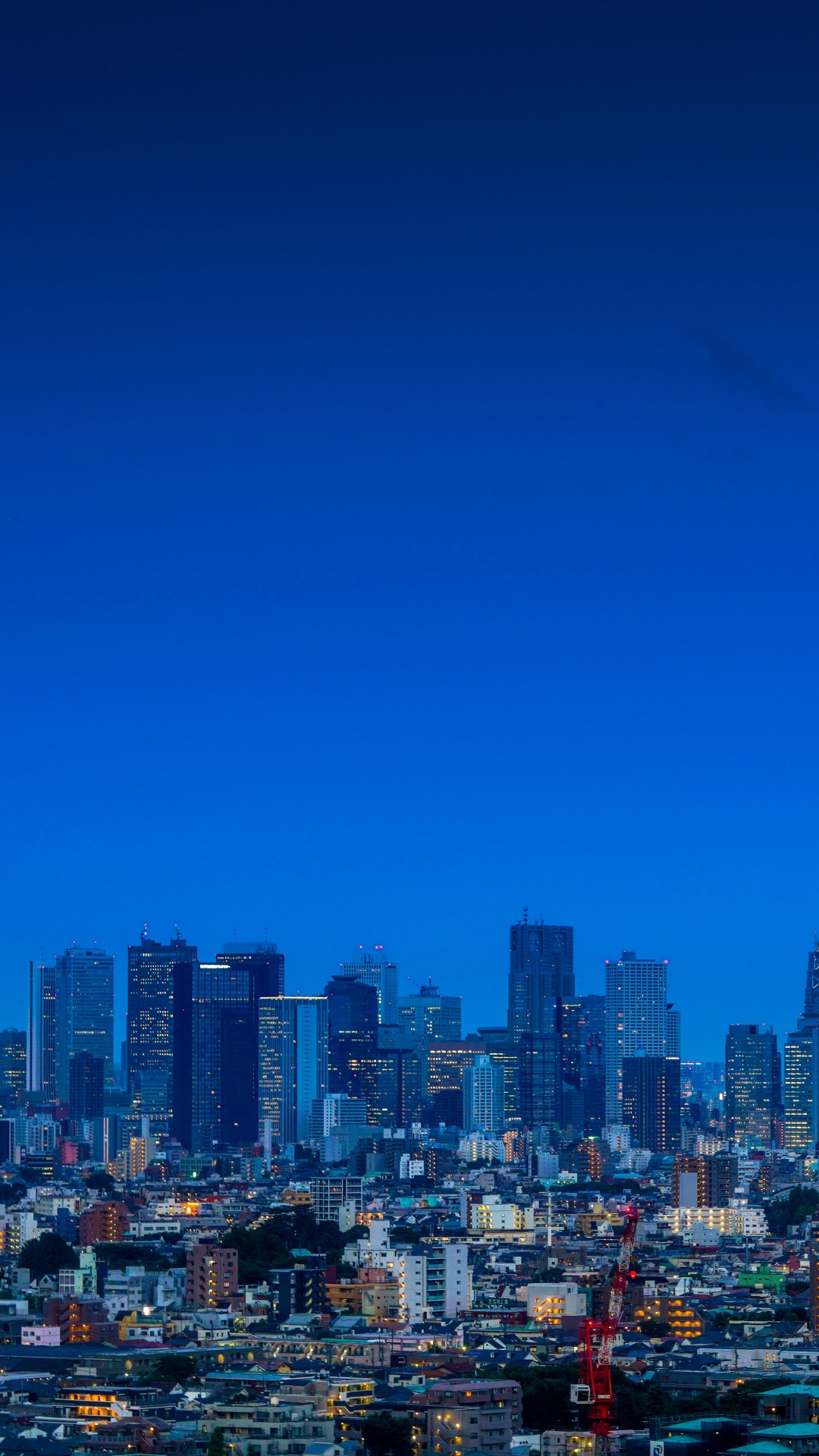 Ciudad Con Edificios de Gran Altura Bajo un Cielo Azul Durante el Día. Wallpaper in 1080x1920 Resolution