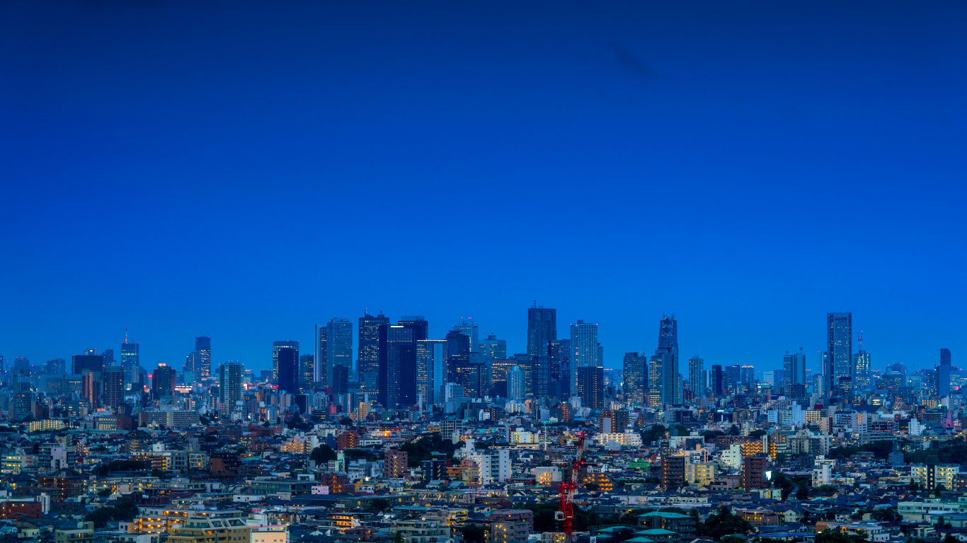 City With High Rise Buildings Under Blue Sky During Daytime. Wallpaper in 1366x768 Resolution