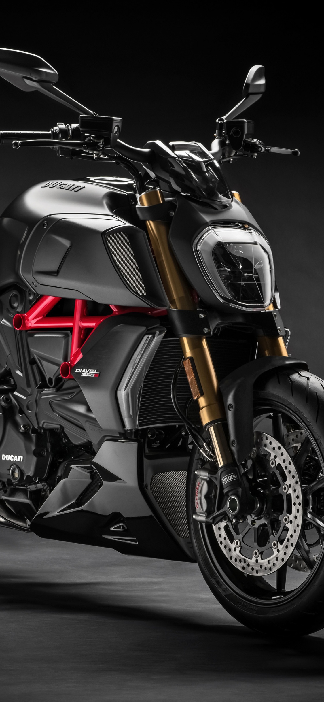 Black and Orange Sports Bike. Wallpaper in 1125x2436 Resolution