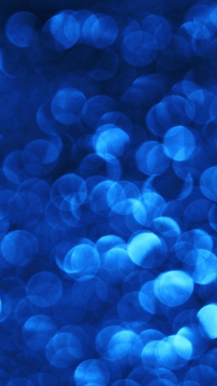 Blue and White Bokeh Lights. Wallpaper in 750x1334 Resolution