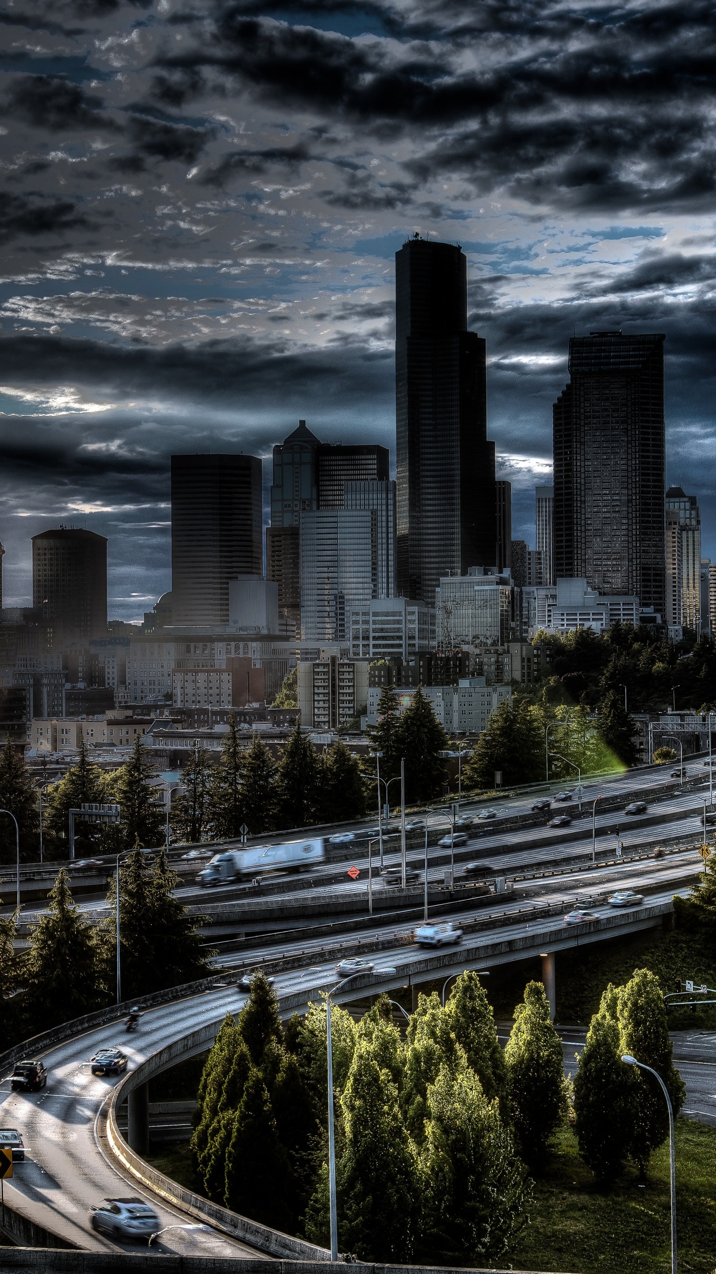 City Buildings Under Gray Clouds During Daytime. Wallpaper in 1440x2560 Resolution