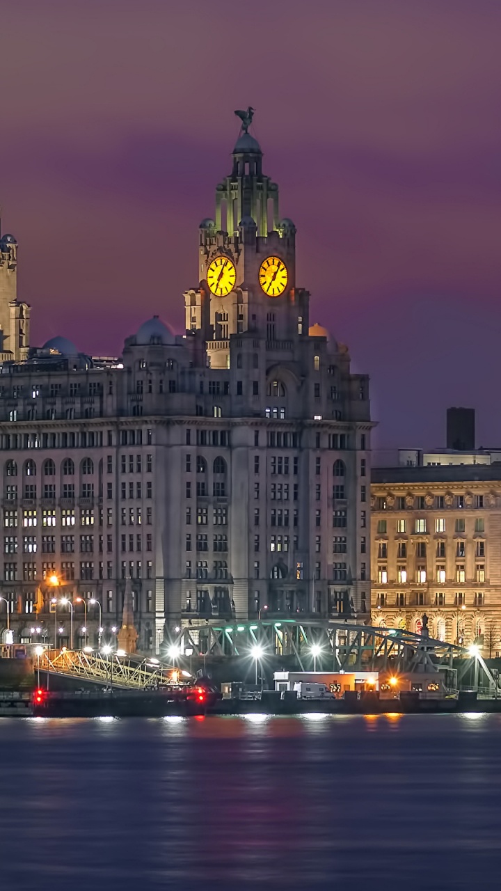 Edificio de Hormigón Marrón Durante la Noche. Wallpaper in 720x1280 Resolution