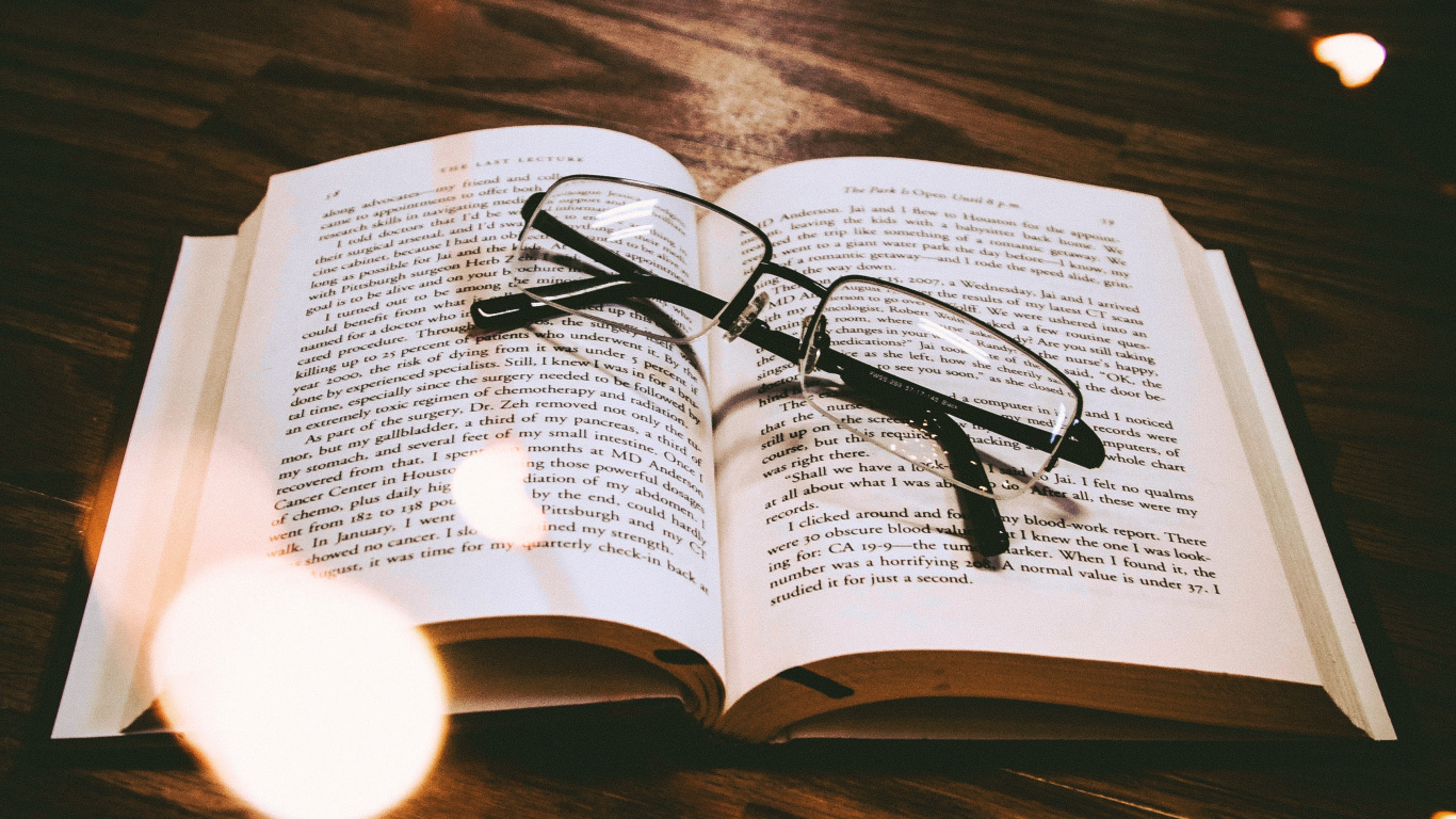 Black Framed Eyeglasses on White Book Page. Wallpaper in 1366x768 Resolution