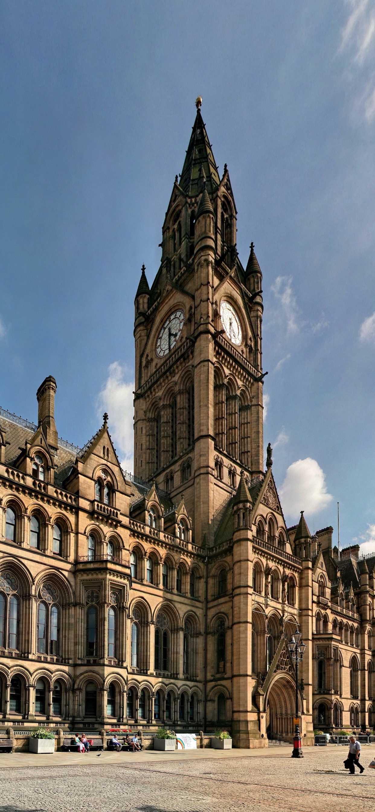 Brown Concrete Building Under Blue Sky During Daytime. Wallpaper in 1242x2688 Resolution