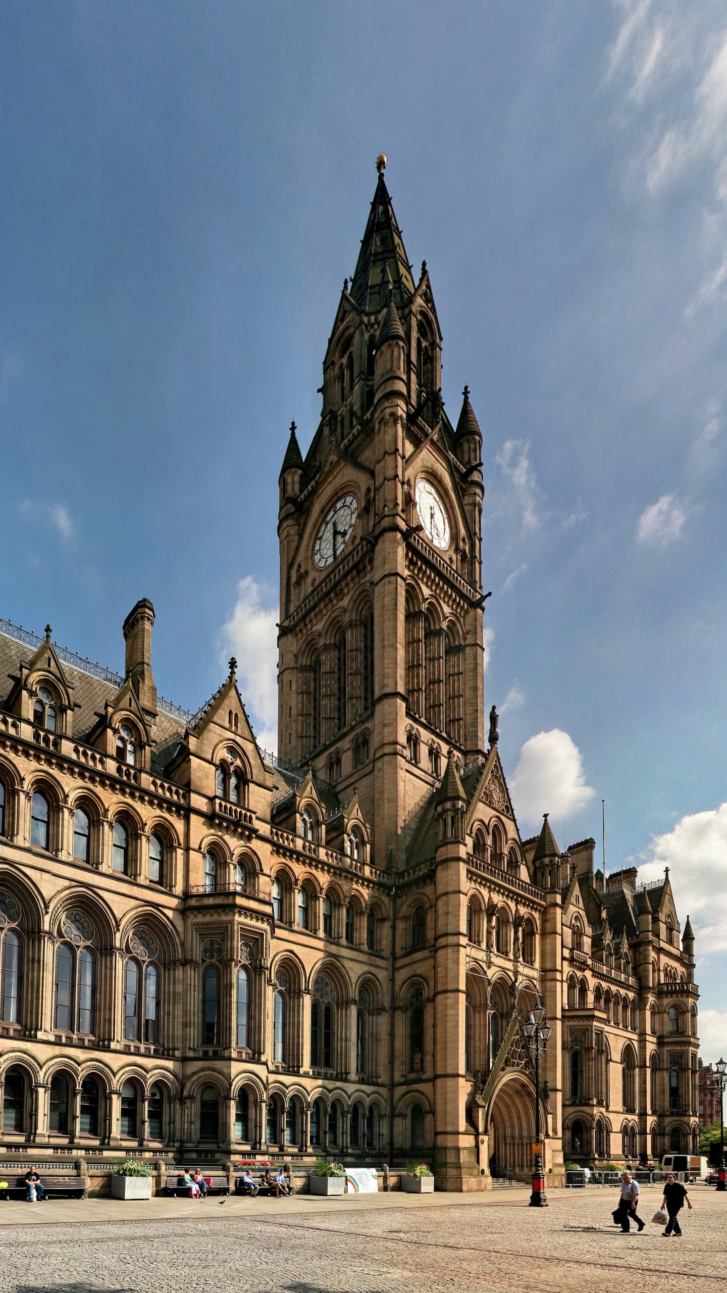 Brown Concrete Building Under Blue Sky During Daytime. Wallpaper in 1440x2560 Resolution