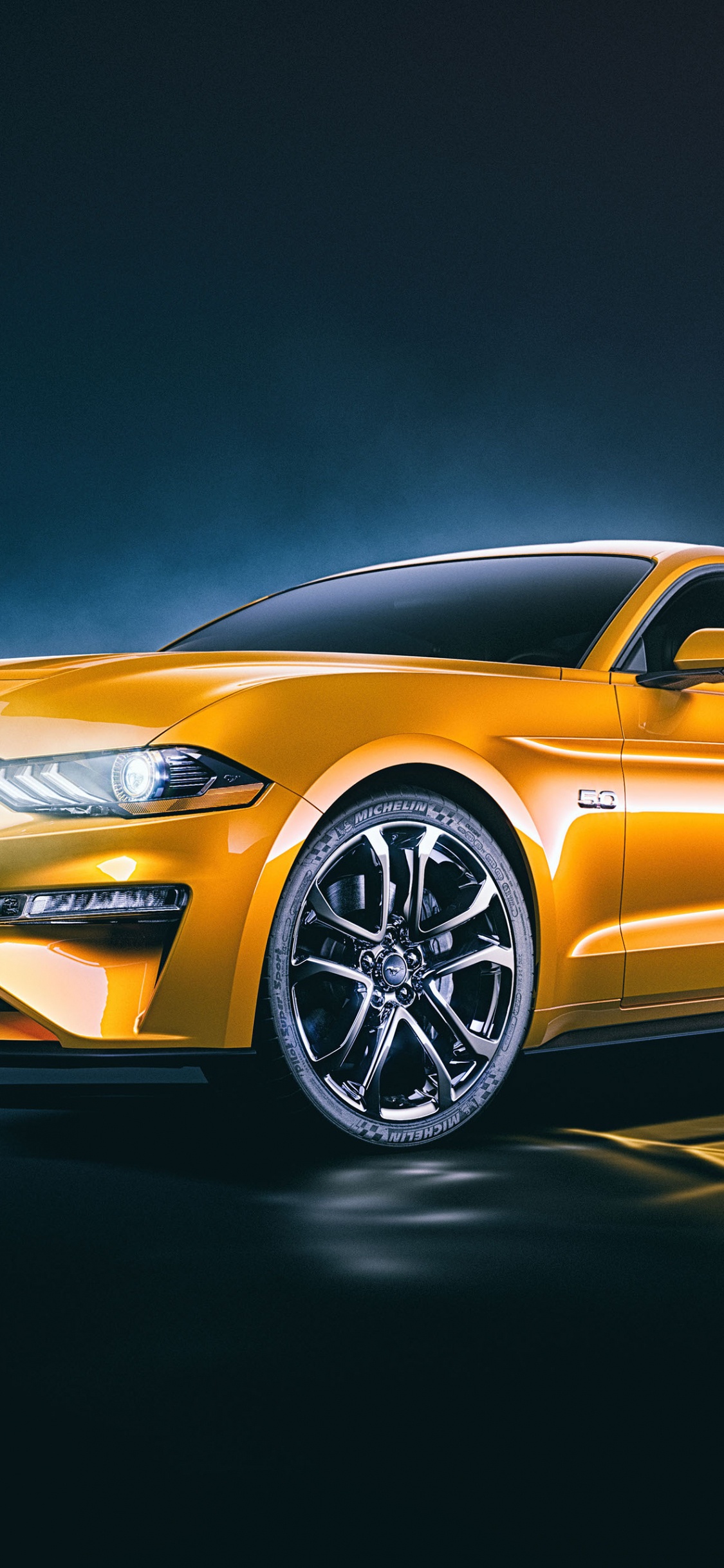 Gold Mercedes Benz Coupe on Black Background. Wallpaper in 1125x2436 Resolution