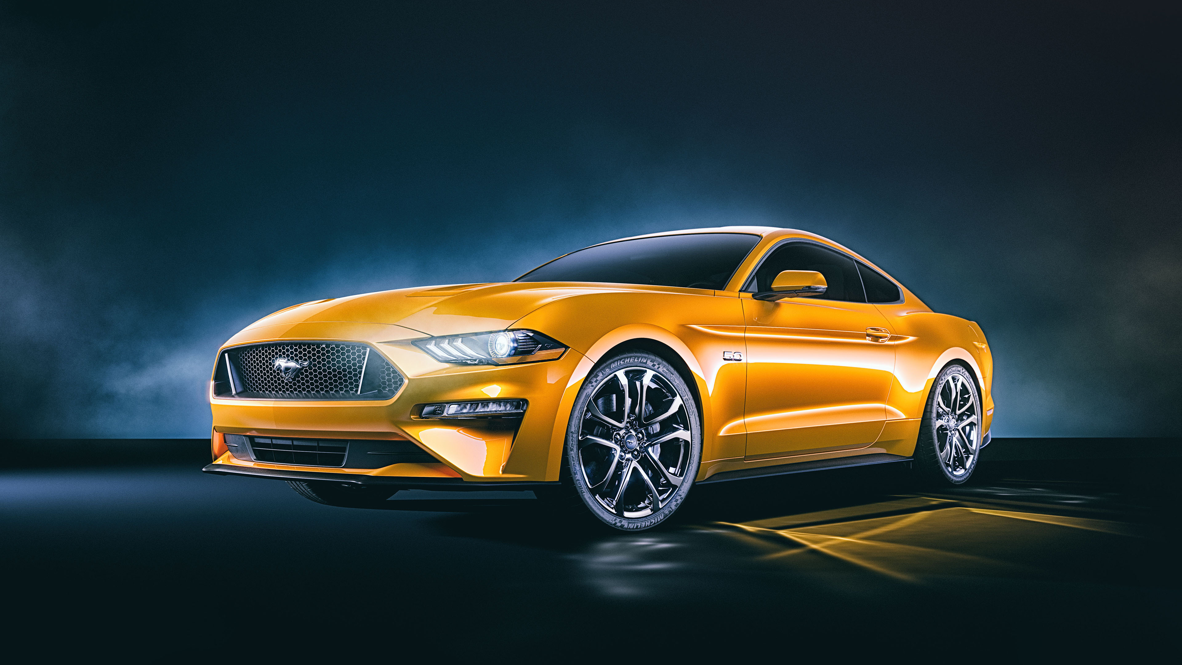 Gold Mercedes Benz Coupe on Black Background. Wallpaper in 3840x2160 Resolution