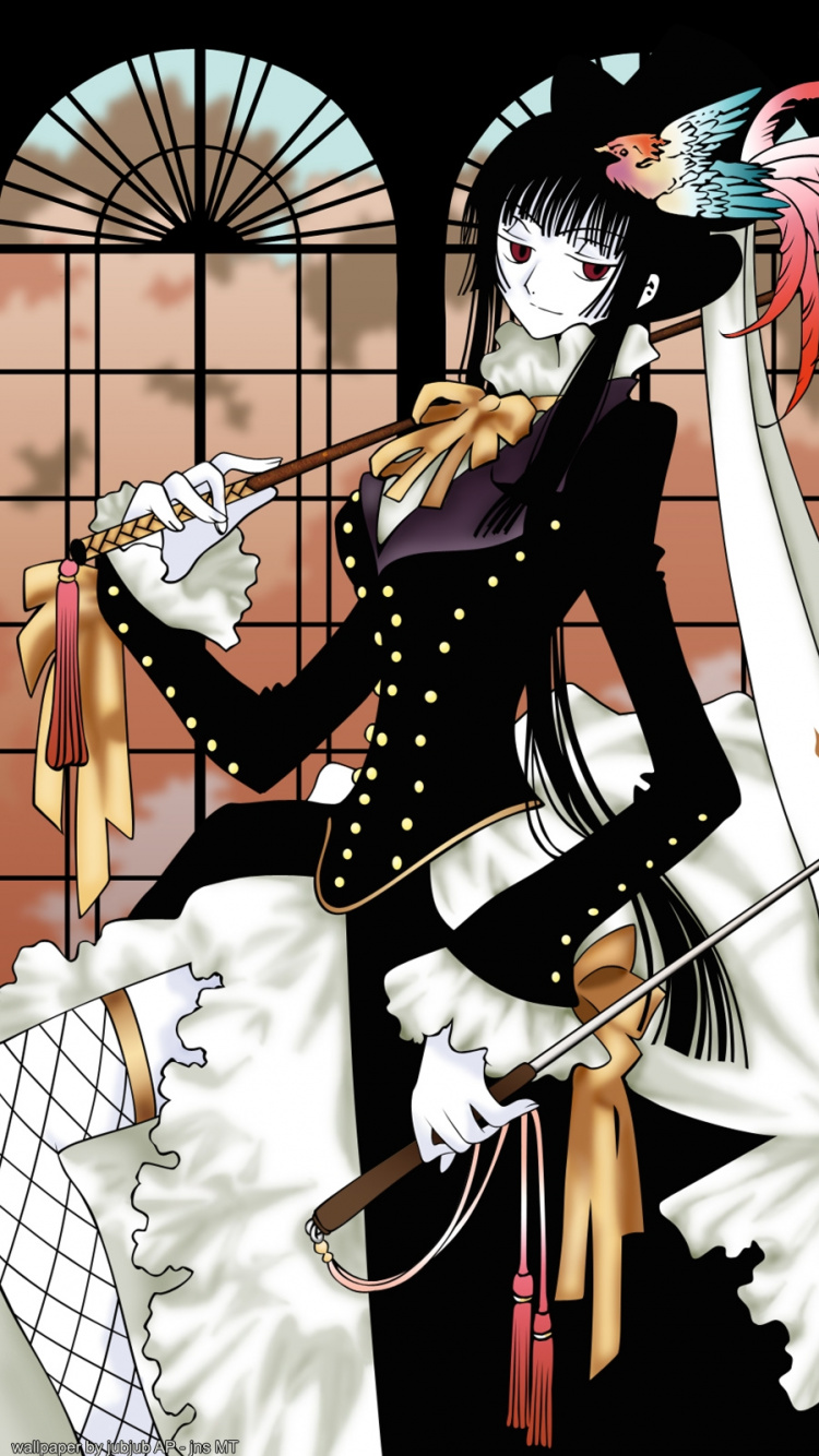 Man in Black Hat and White and Black Costume. Wallpaper in 750x1334 Resolution