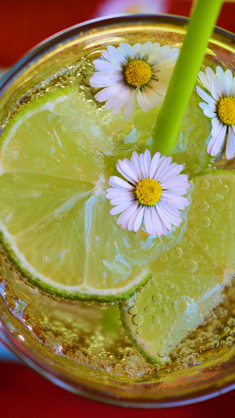 Clear Drinking Glass With Yellow Straw. Wallpaper in 750x1334 Resolution