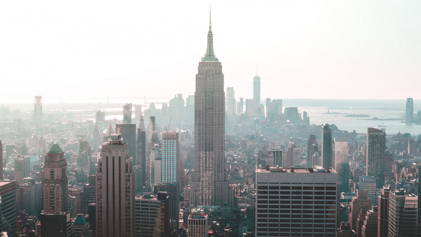 City Skyline Under White Sky During Daytime. Wallpaper in 1366x768 Resolution