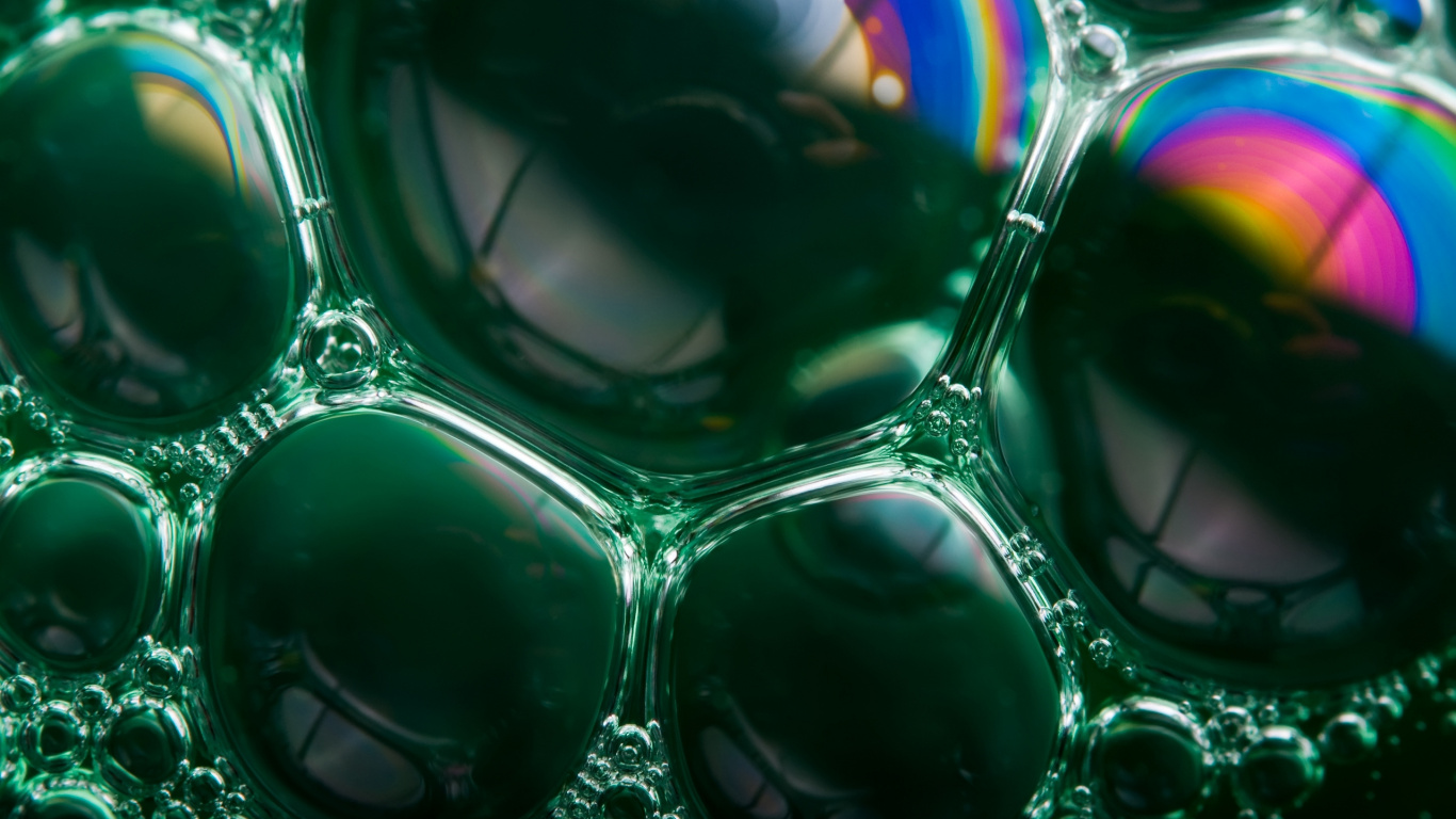 Green and Black Round Ball. Wallpaper in 1366x768 Resolution