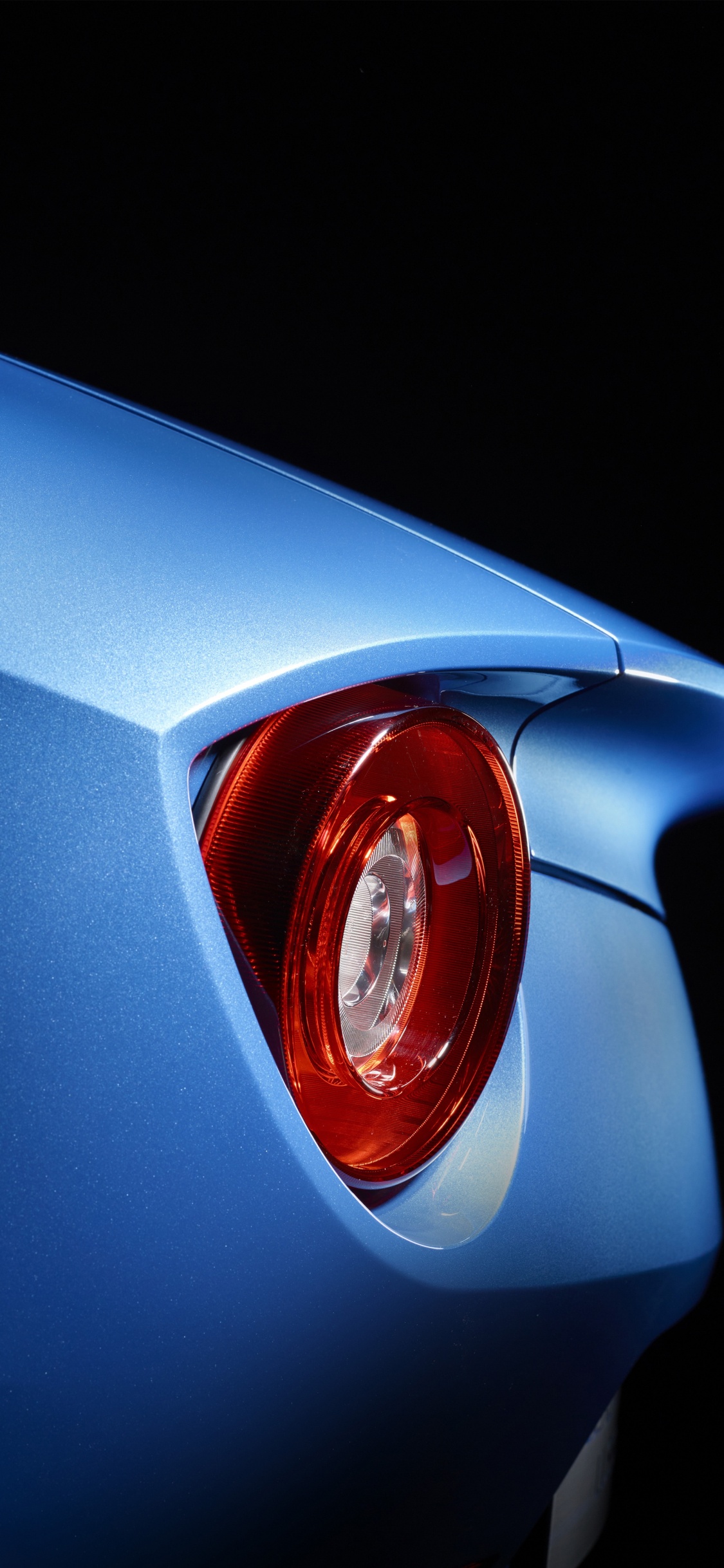 Blue Car With Red Light. Wallpaper in 1125x2436 Resolution