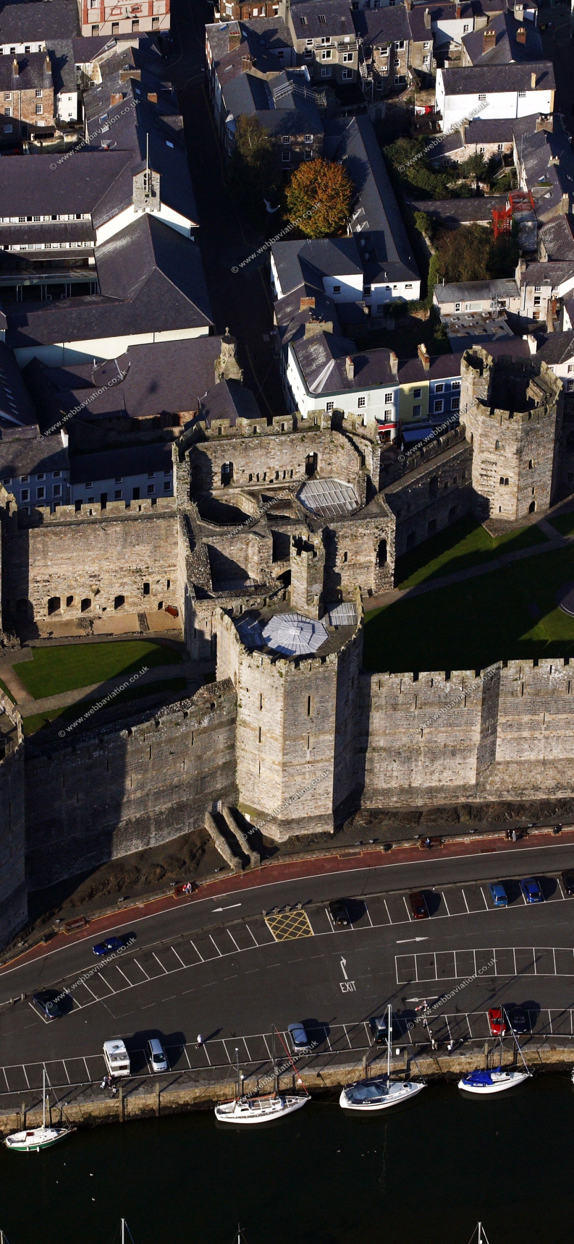 Aerial View of City Buildings During Night Time. Wallpaper in 1125x2436 Resolution