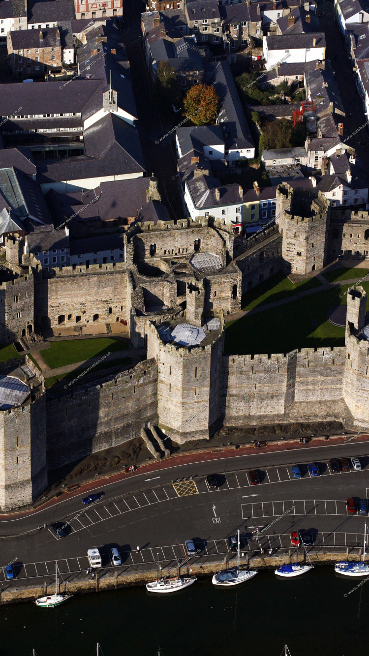 Aerial View of City Buildings During Night Time. Wallpaper in 750x1334 Resolution
