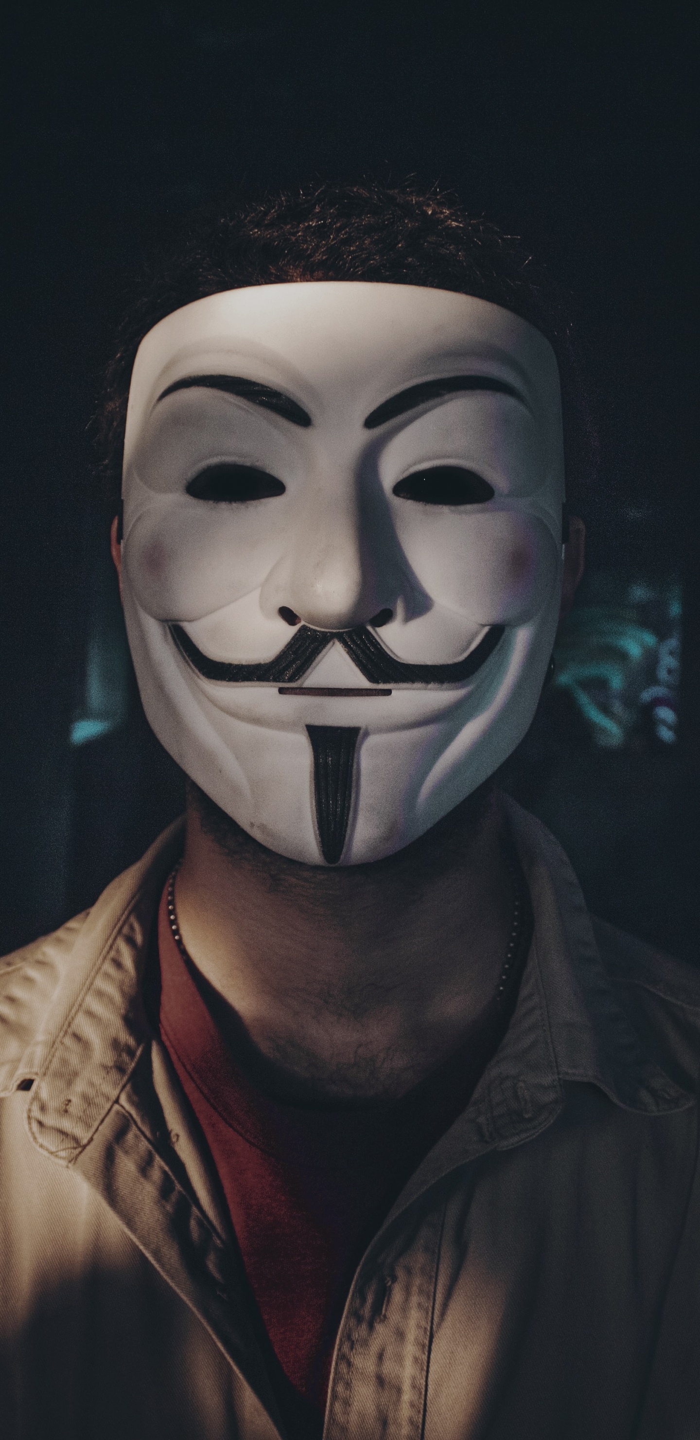 Man in Brown Leather Jacket Wearing White Mask. Wallpaper in 1440x2960 Resolution