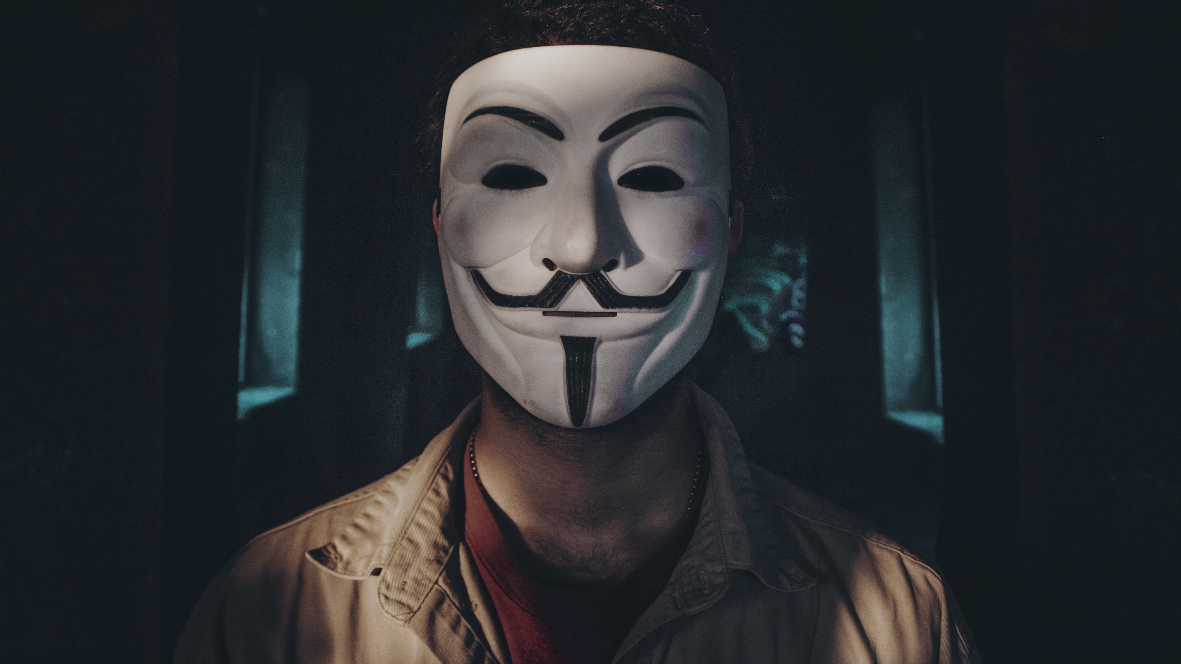 Man in Brown Leather Jacket Wearing White Mask. Wallpaper in 3840x2160 Resolution