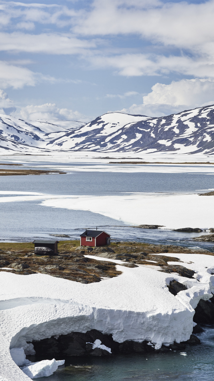 Snow Covered Mountain Near Body of Water During Daytime. Wallpaper in 750x1334 Resolution