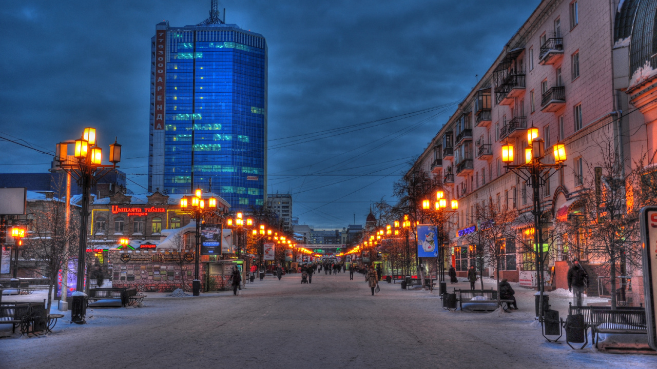 People Walking on Sidewalk Near High Rise Buildings During Night Time. Wallpaper in 1280x720 Resolution