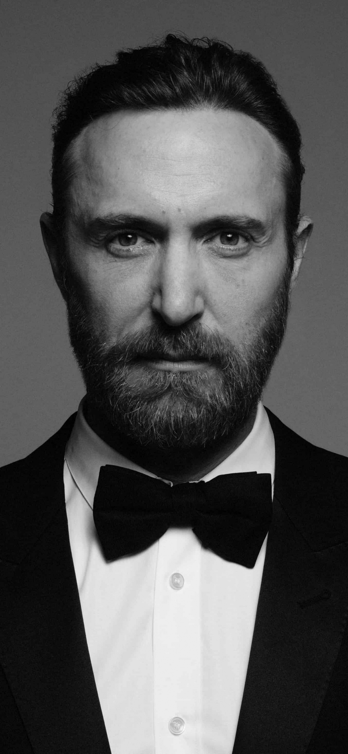 David Guetta, Electronic Dance Music, Hair, Facial Hair, Suit. Wallpaper in 1125x2436 Resolution