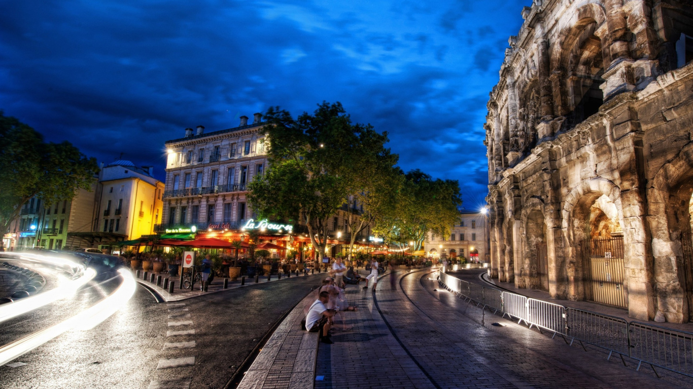 People Walking on Sidewalk Near Building During Daytime. Wallpaper in 1366x768 Resolution