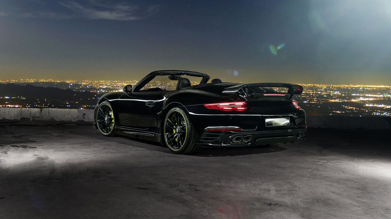 Black Porsche 911 on Gray Sand During Daytime. Wallpaper in 1366x768 Resolution