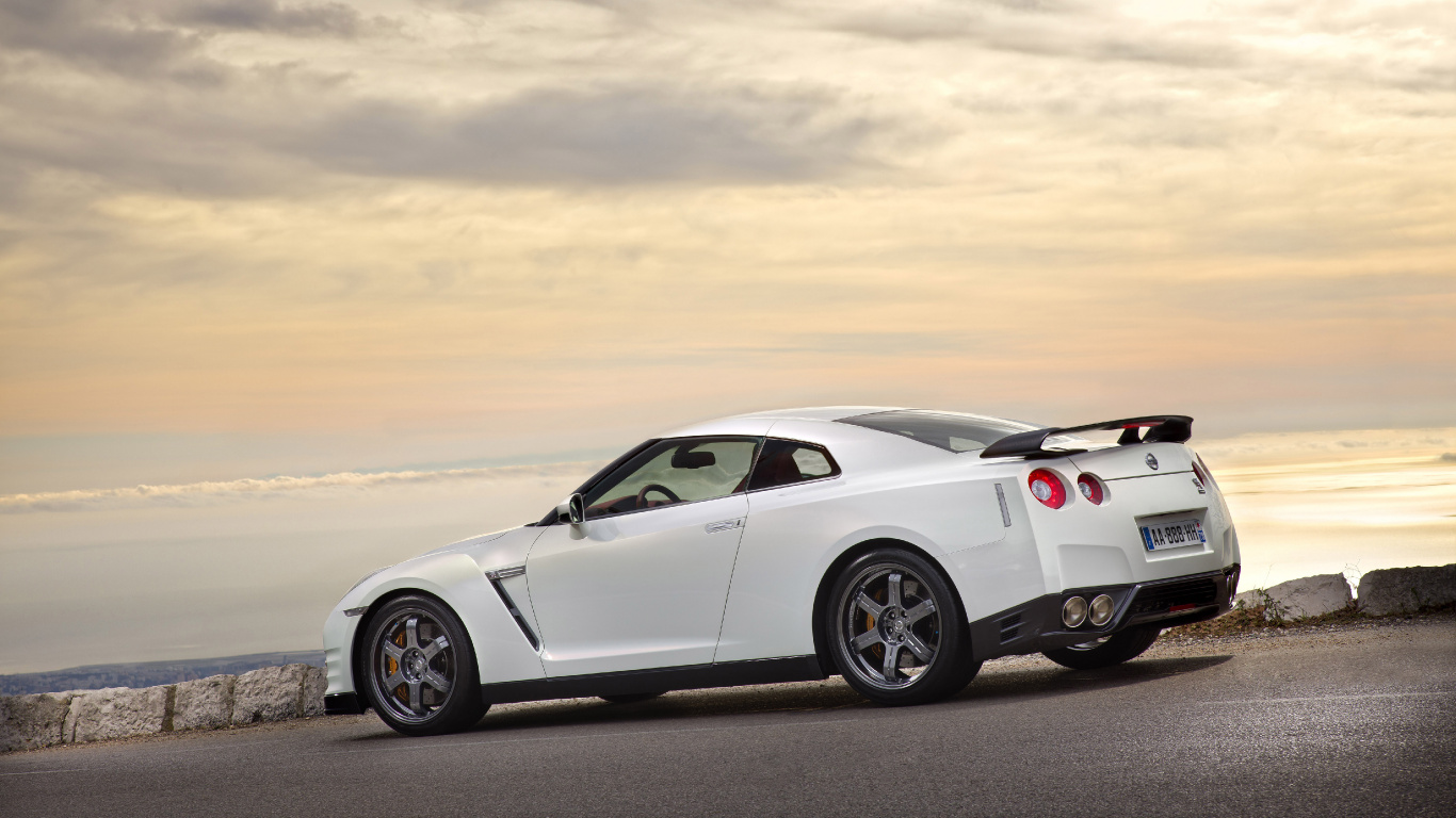 White Porsche 911 on Beach During Daytime. Wallpaper in 1366x768 Resolution
