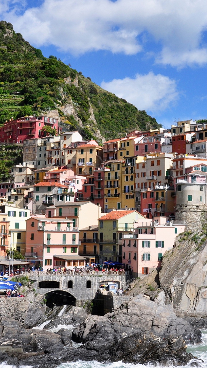 Houses on Mountain Near Body of Water During Daytime. Wallpaper in 720x1280 Resolution