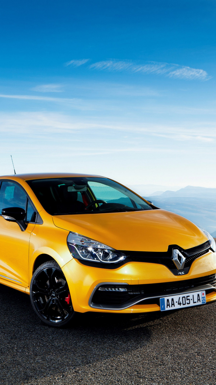 Yellow Sedan on Brown Sand Under Blue Sky During Daytime. Wallpaper in 750x1334 Resolution