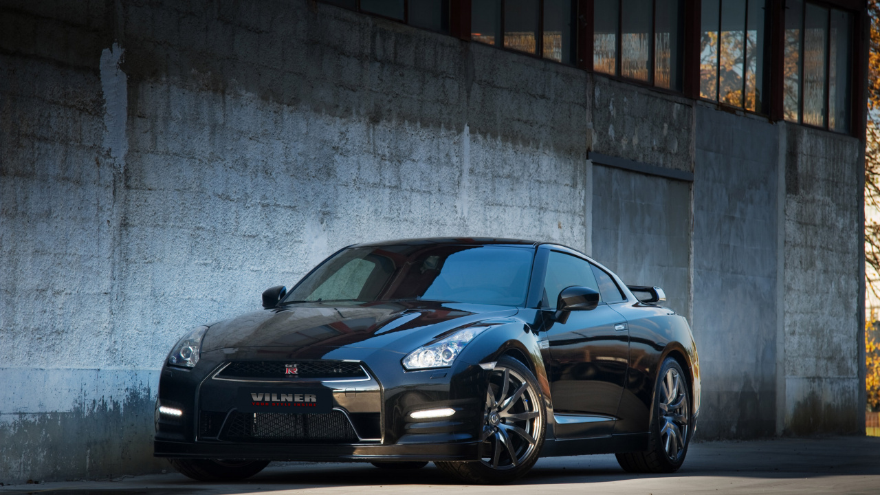 Blue Porsche 911 Parked Beside Wall. Wallpaper in 1280x720 Resolution