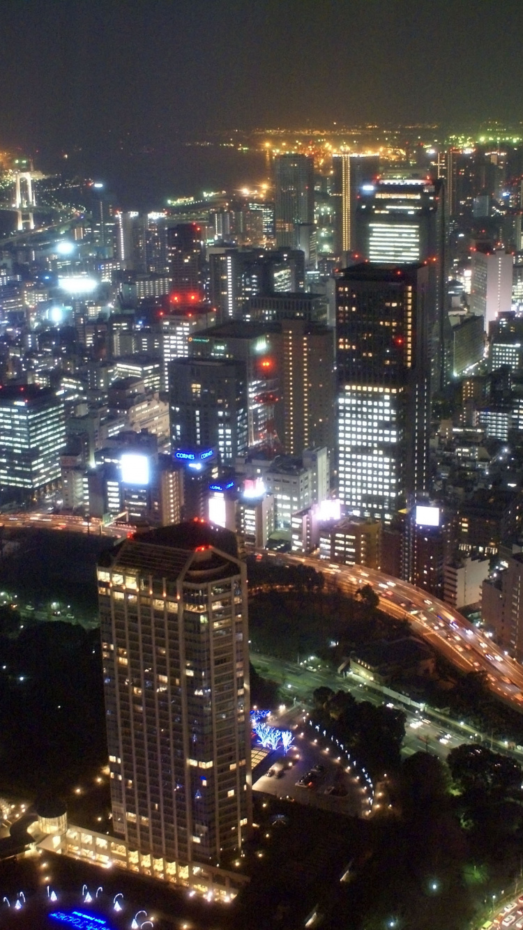 Aerial View of City During Night Time. Wallpaper in 750x1334 Resolution