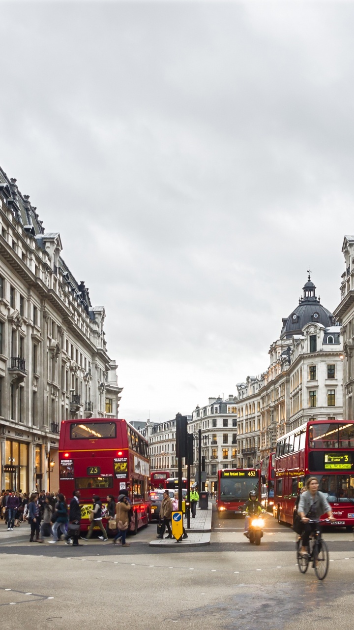 People Walking on Street Near Red Double Decker Bus During Daytime. Wallpaper in 720x1280 Resolution