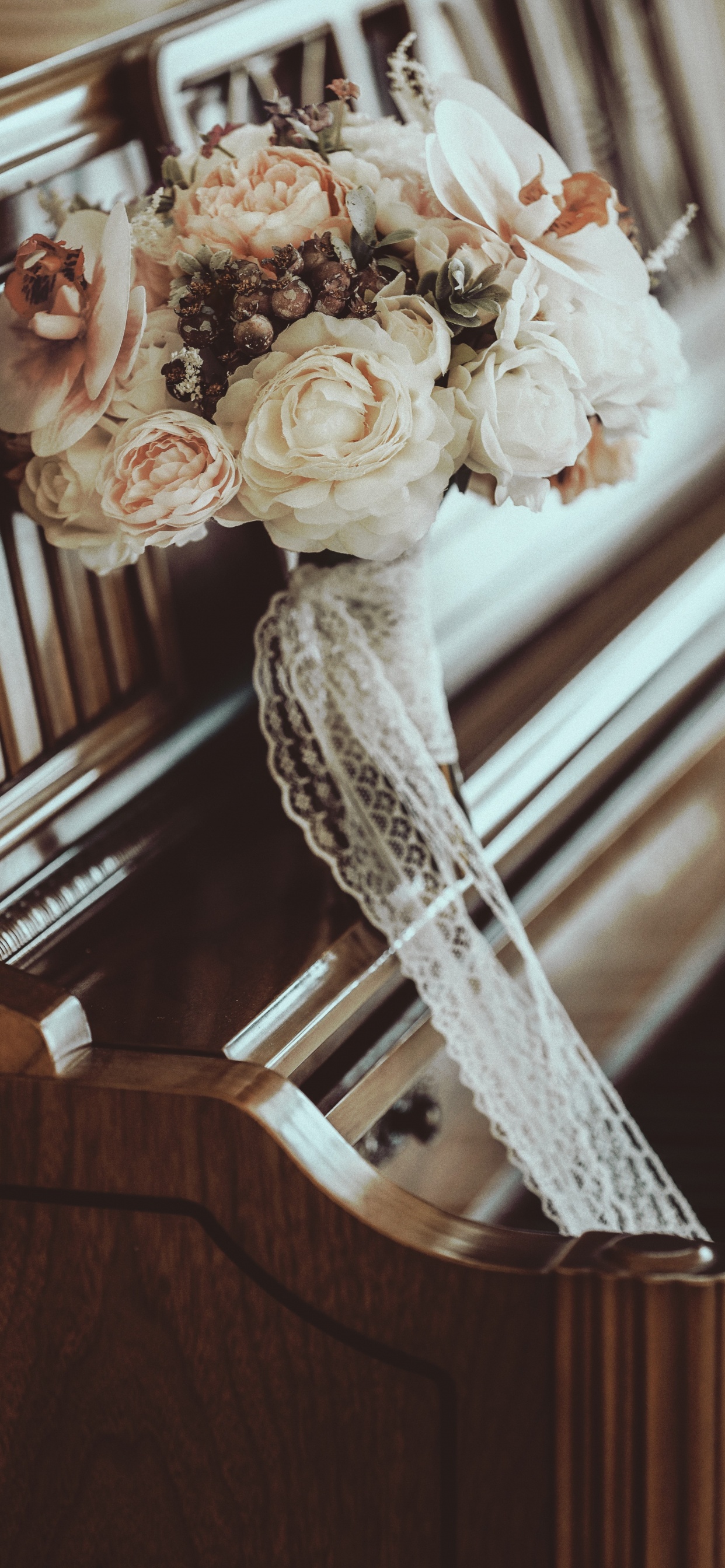 White Floral Ceramic Figurine on Brown Wooden Table. Wallpaper in 1242x2688 Resolution