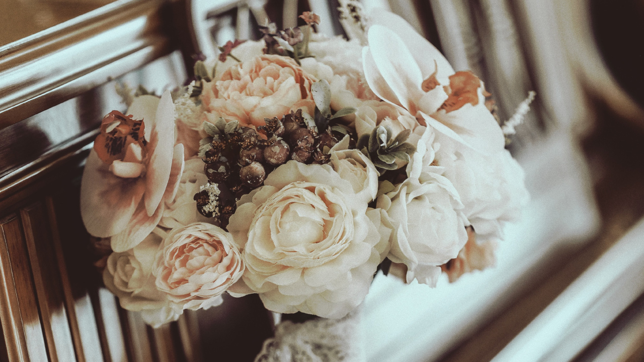 White Floral Ceramic Figurine on Brown Wooden Table. Wallpaper in 1280x720 Resolution
