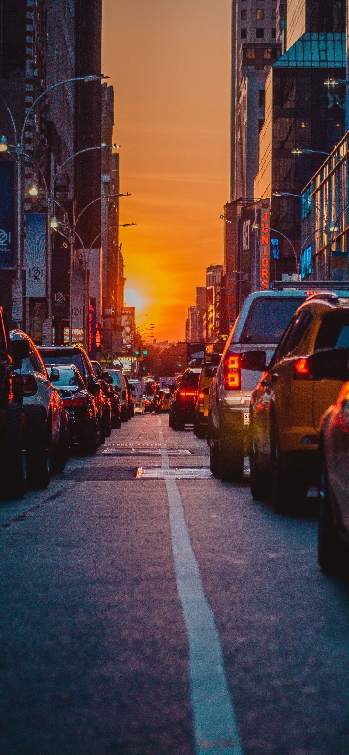 Cars on Road During Night Time. Wallpaper in 1125x2436 Resolution