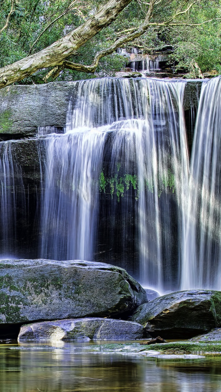 Water Falls on Rocky Shore During Daytime. Wallpaper in 720x1280 Resolution