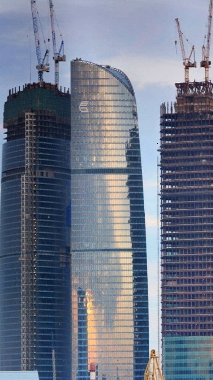 High Rise Buildings During Daytime. Wallpaper in 720x1280 Resolution