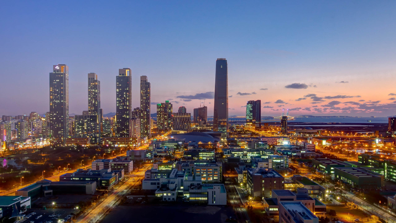 City With High Rise Buildings During Night Time. Wallpaper in 1280x720 Resolution