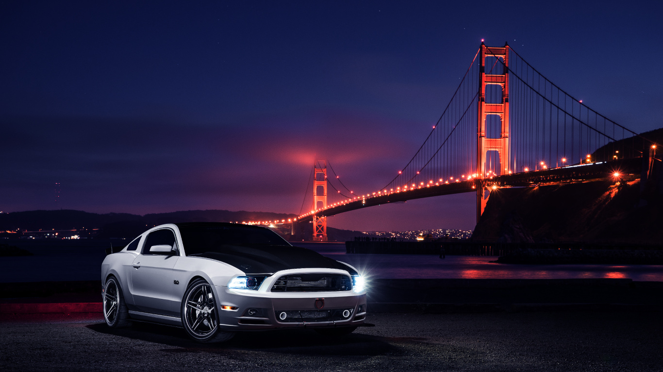 White Porsche 911 Parked Near Golden Gate Bridge During Night Time. Wallpaper in 1366x768 Resolution