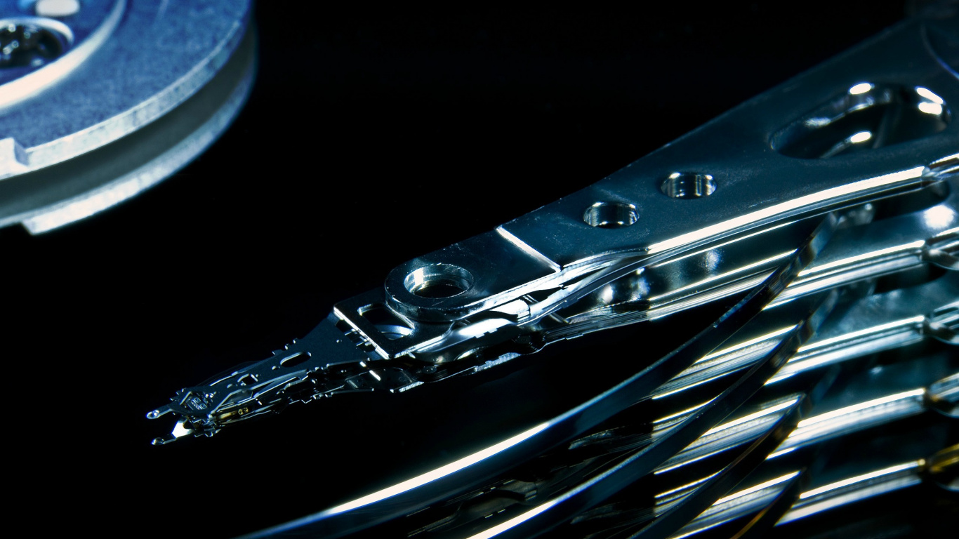 Stainless Steel Nail Cutter on Black Surface. Wallpaper in 1366x768 Resolution