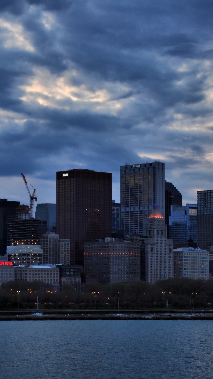City Skyline Under Cloudy Sky During Daytime. Wallpaper in 720x1280 Resolution