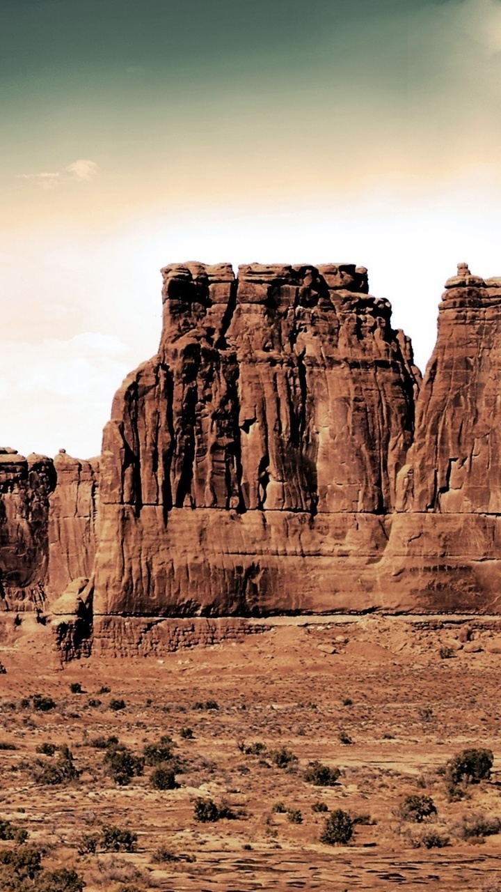 Brown Rock Formation Under White Clouds During Daytime. Wallpaper in 720x1280 Resolution