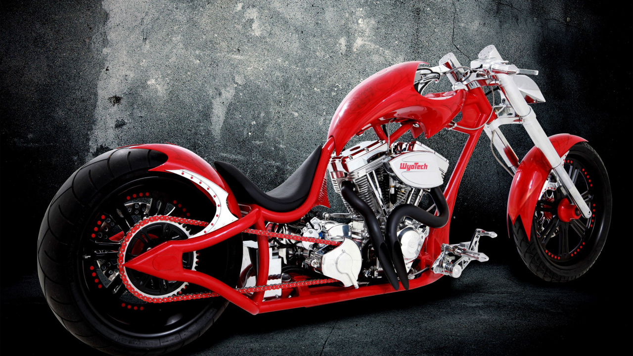 Motocicleta Roja y Negra Sobre Piso de Concreto Gris. Wallpaper in 1280x720 Resolution