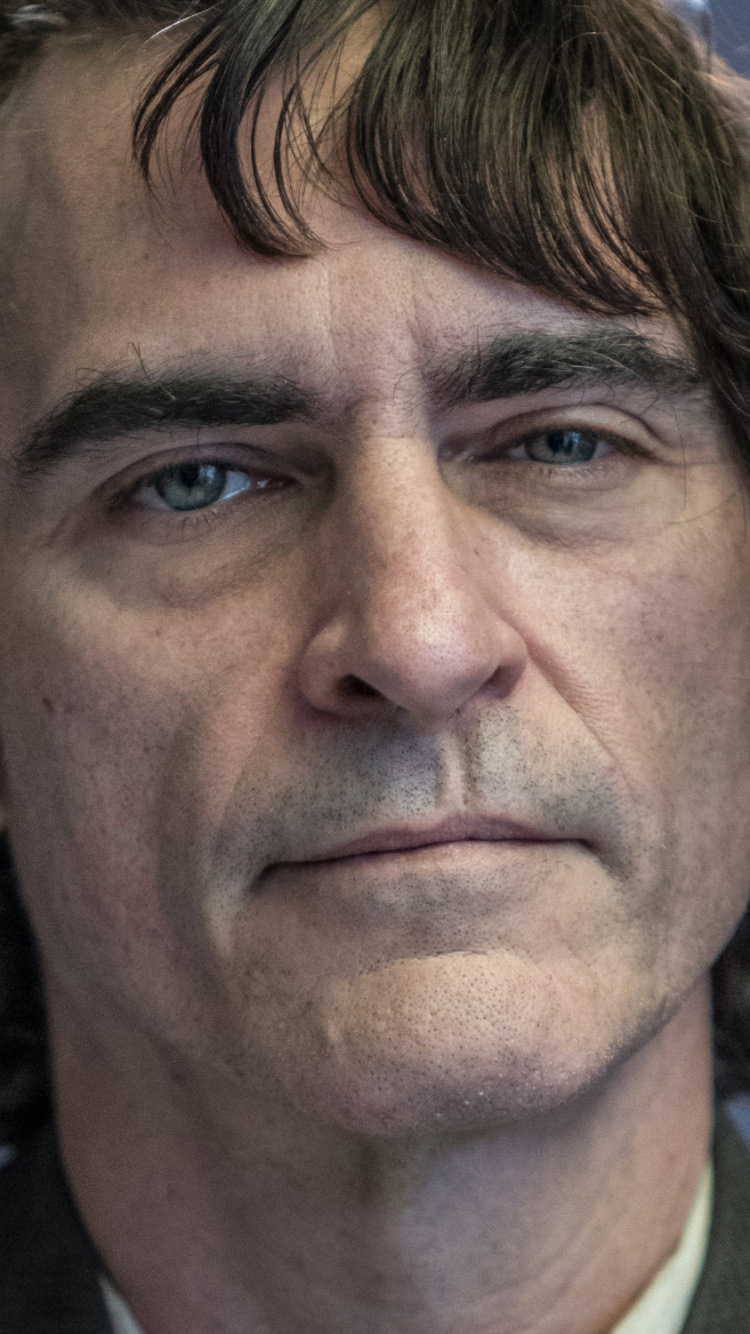 Man in Green Collared Shirt. Wallpaper in 750x1334 Resolution