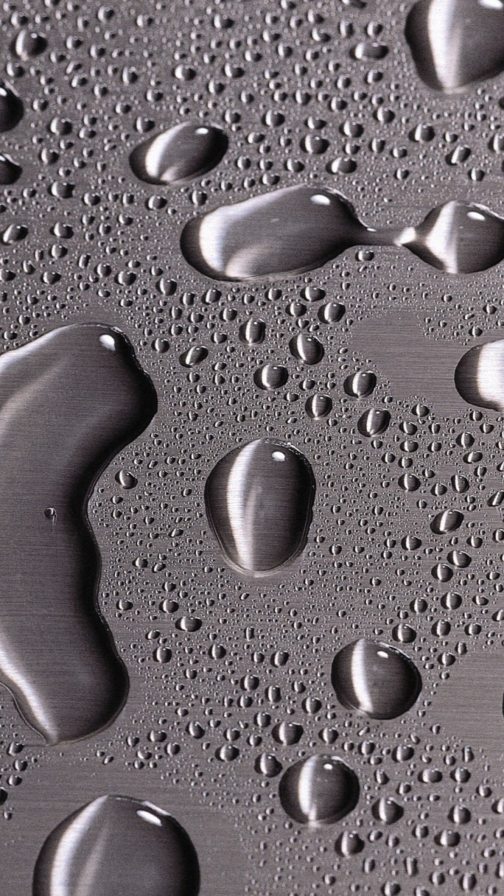 Water Droplets on Gray Surface. Wallpaper in 720x1280 Resolution